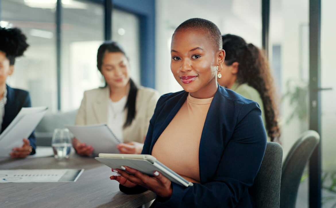 Business meeting, black woman and portrait with tablet for online planning, strategy and smile. Happy female worker working on digital technology for productivity, connection and happiness in startup